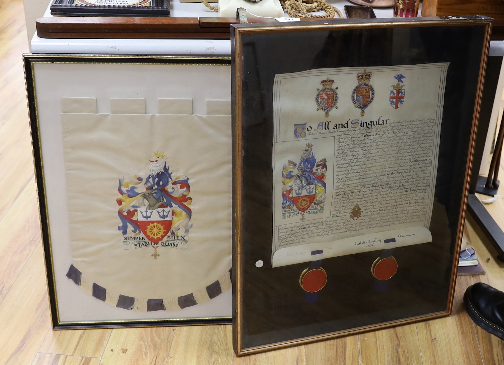 Two related regimental bearings, each framed